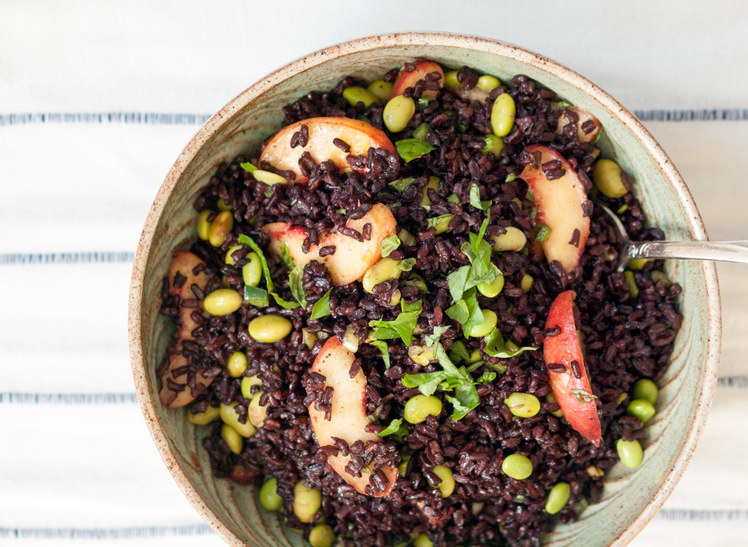 black rice salad with peaches and edamame